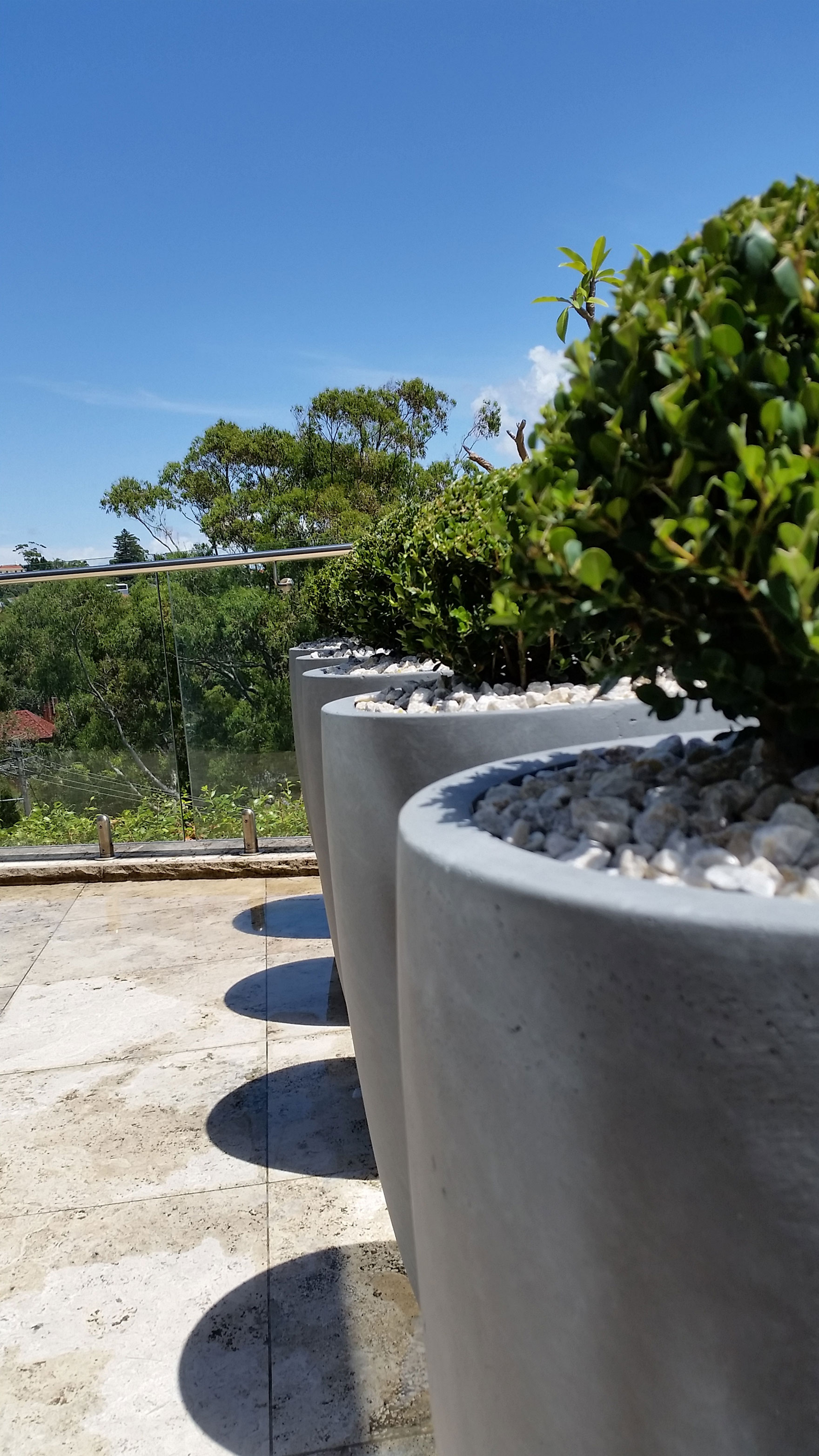 Planters along balcony edge